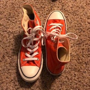 Orange high top converse